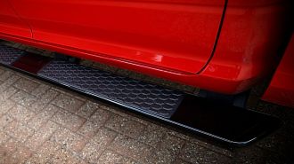 2018 Ram 1500 Night Quad Cab 2WD with Mopar running board.