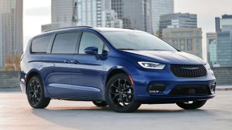2021 Chrysler Pacifica Limited AWD S in blue parked on a rooftop.