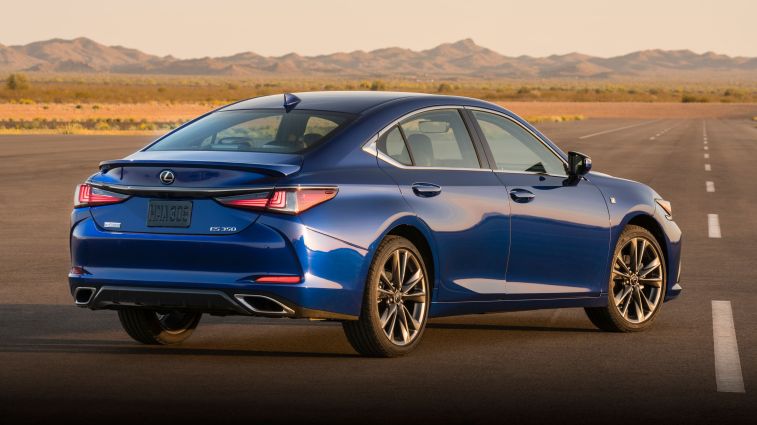 2021 Lexus ES in blue with mountains in the background.