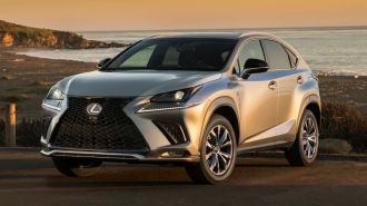 2021 Lexus NX near the beach at sunset.