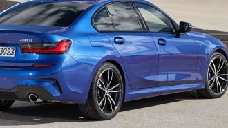 A detail of the rear badge on the 2024 bmw 330i