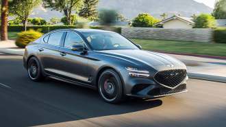 2024 Genesis G70 in charcoal gray.