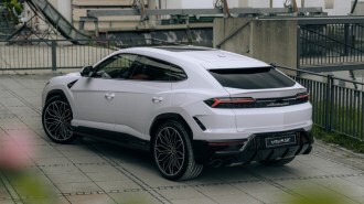 The 2024 Lamborghini Urus seen from a rear quarter angle