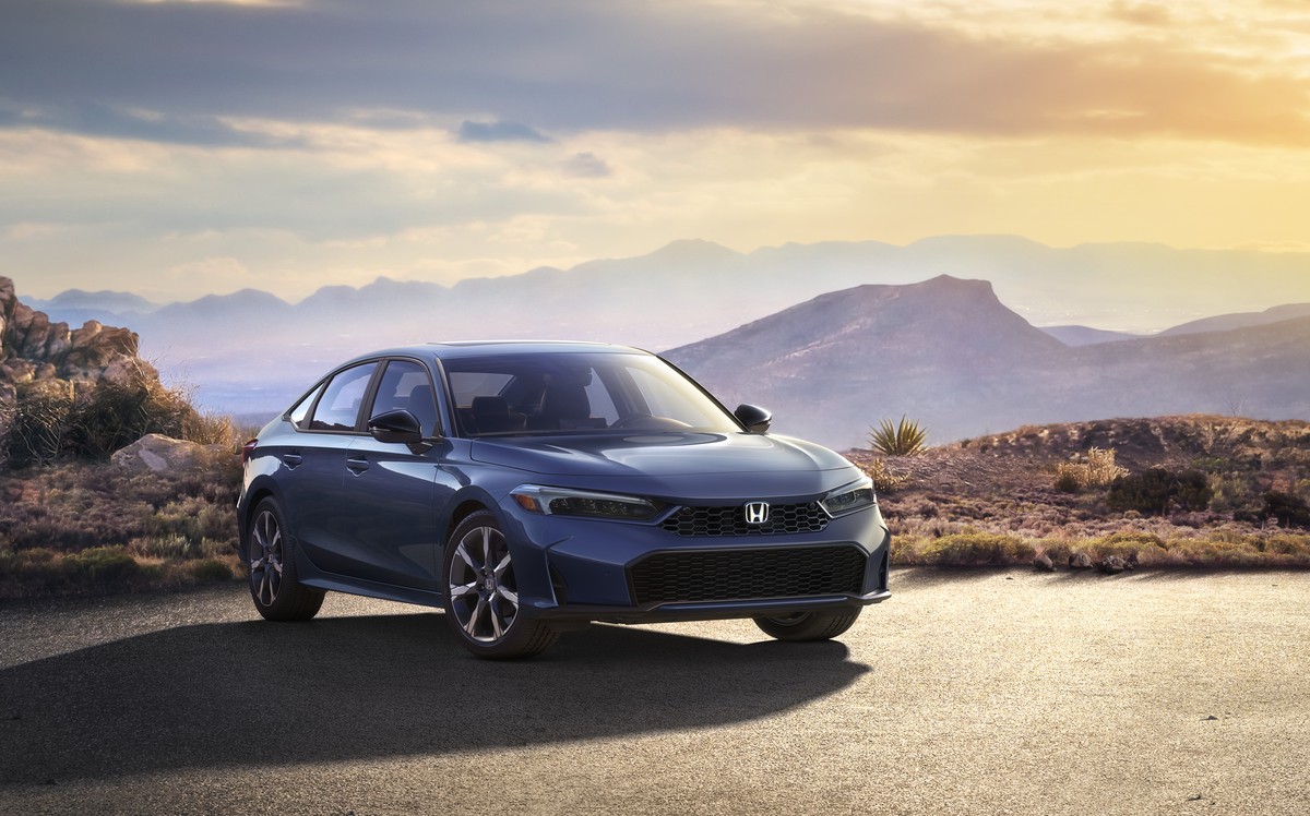 The 2025 Honda Civic Hybrid sedan seen from a front quarter angle