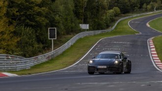 A teaser photo from Porsche showing a hybrid 911 in track testing