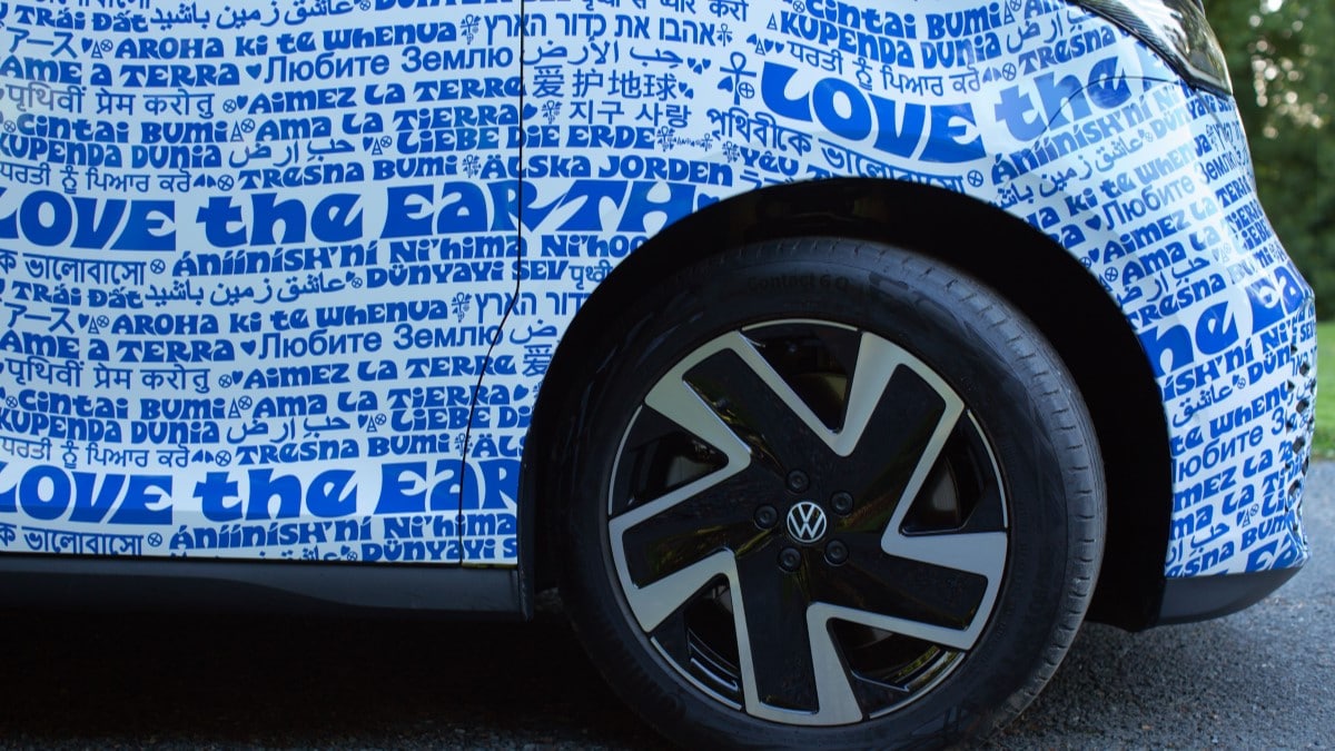 A detail photo of the 2025 Volkswagen ID.Buzz in a wrap by artist Bob Hieronymous