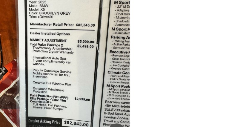 2025 BMW X5 pricing at a dealership recently.