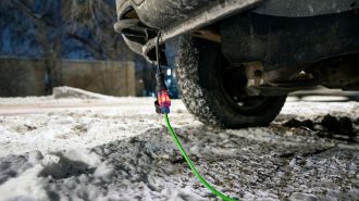 Extension cord plugged into engine block heater.