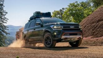 2024 Ford Expedition Timberline towing a trailer.
