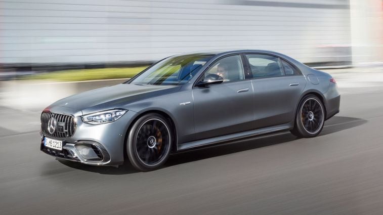 2024 Mercedes-AMG S 63 E PERFORMANCE driving on a road.