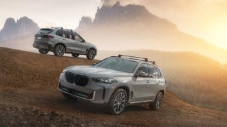 The 2025 BMW 5 Silver Anniversary Edition seen from front and rear quarter angles