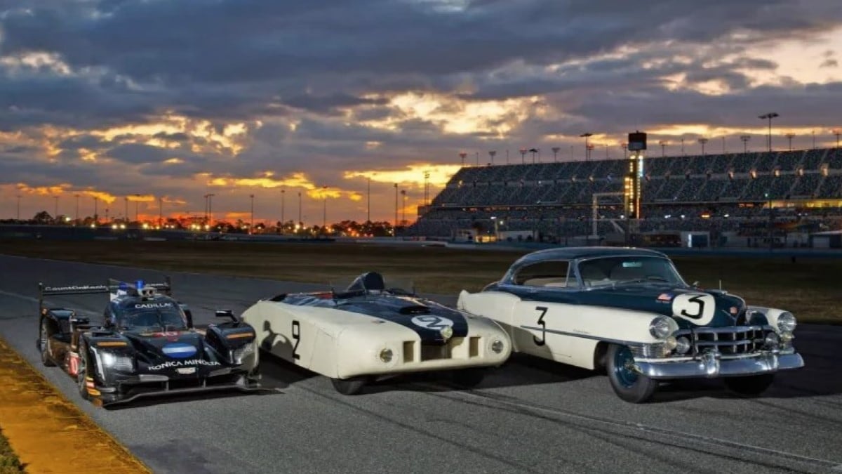 Le Monstre (center) and Petit Pataud (right), two historically important Cadillac race cars, alongside a modern Cadillac Le Mans racer in 2019
