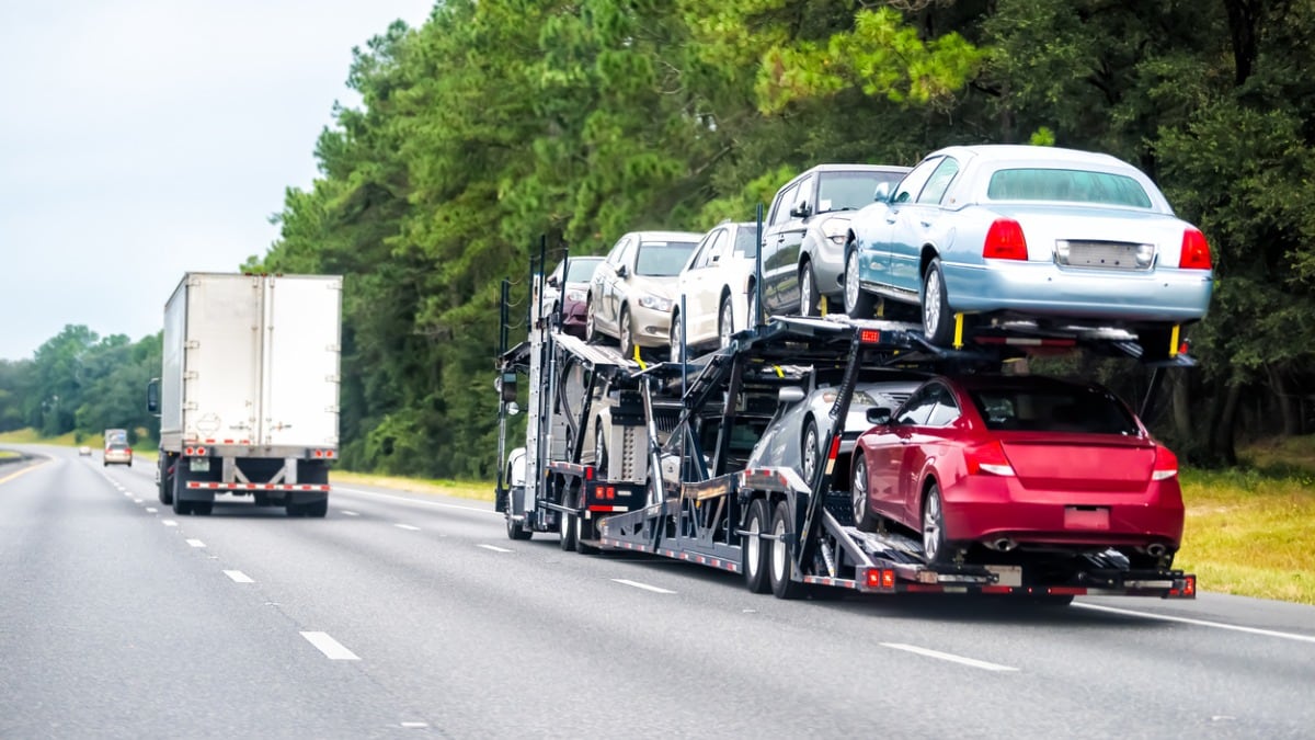 A car carrier shipping vehicles for long-distance move.