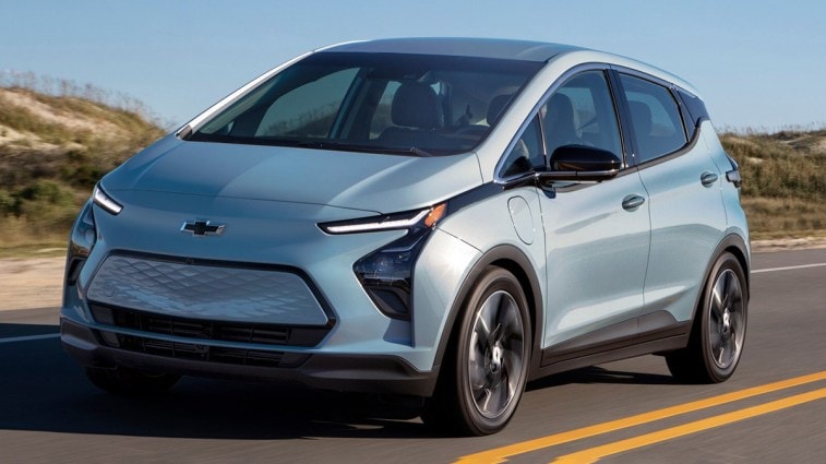 2022 Chevrolet Bolt EV driving on the road.