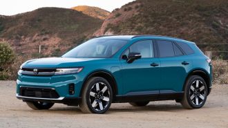 2024 Honda Prologue in North Shore Pearl with hills in the background.