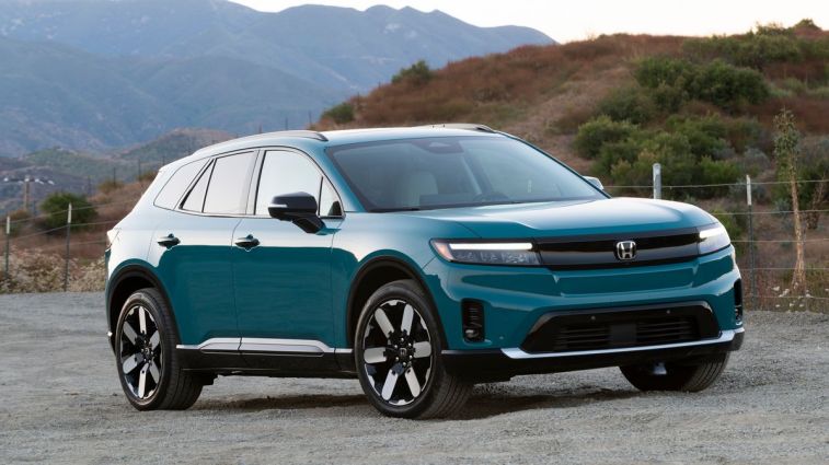2024 Honda Prologue in North Shore Pearl with hills in the background.