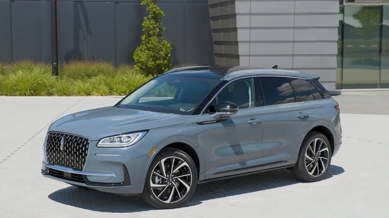 2024 Lincoln Corsair Grand Touring in front of building.