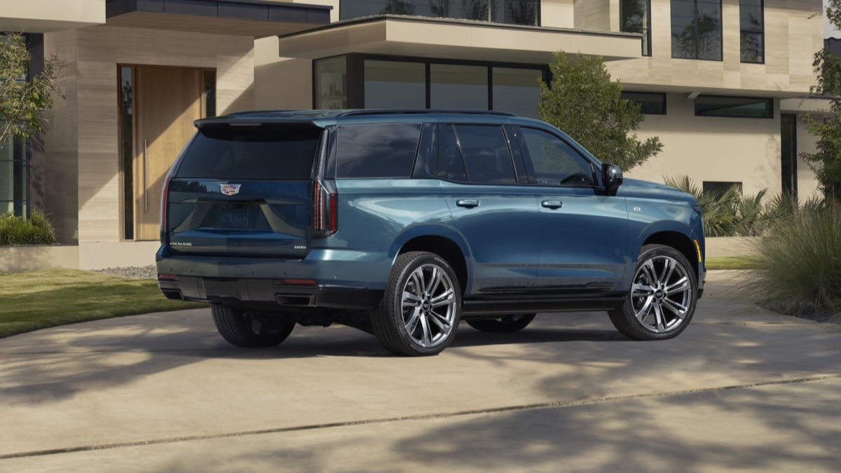 The 2025 Cadillac Escalade seen from a rear quarter angle