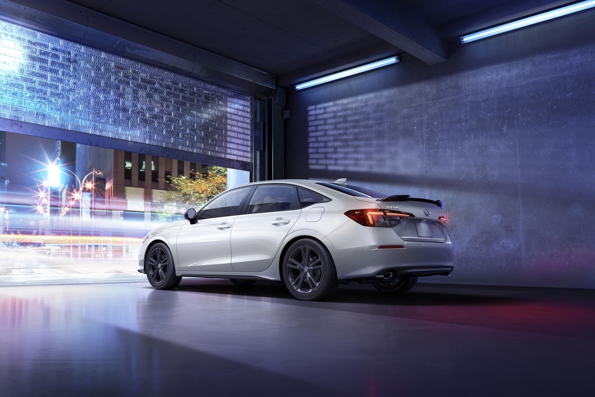 The 2025 Honda Civic Si seen from a rear quarter angle