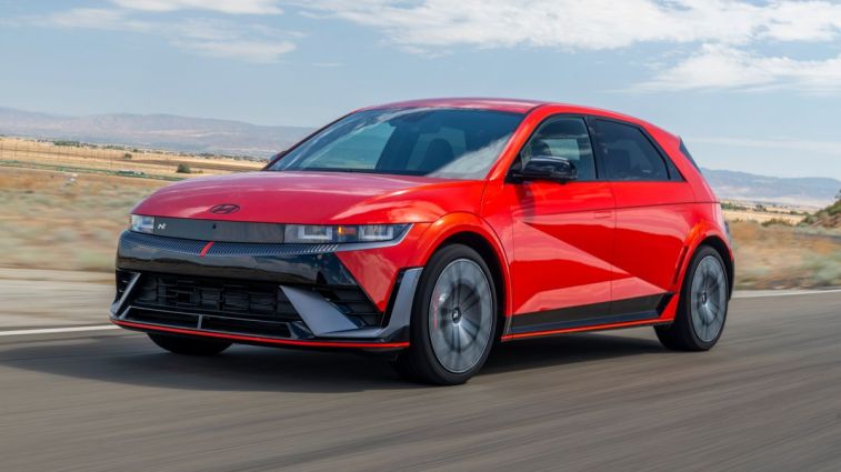 2025 Hyundai Ioniq 5 N in Soultronic Orange driving at Willow Springs.