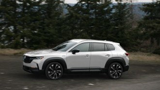 The 2025 Mazda CX-50 Hybrid seen in profile