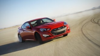 The 2013 Hyundai Genesis Coupe seen from a front quarter angle