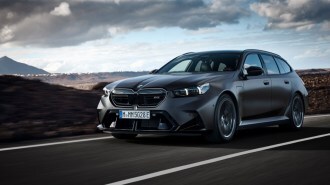 The 2025 BMW M5 Touring seen from a front quarter angle