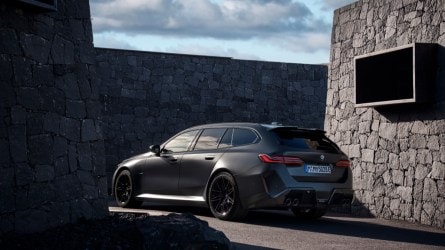 The 2025 BMW M5 Touring seen from a rear quarter angle