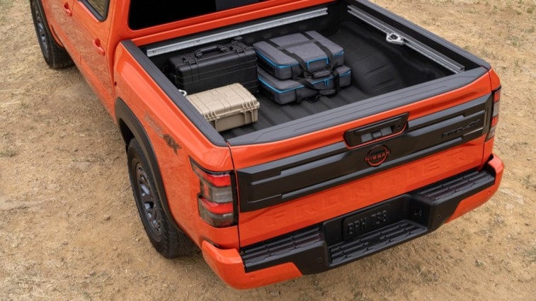 The 2025 Nissan Frontier seen from a rear overhead angle