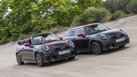 The 2025 Mini John Cooper Works hardtop and convertible models side by side, seen from a front quarter angle
