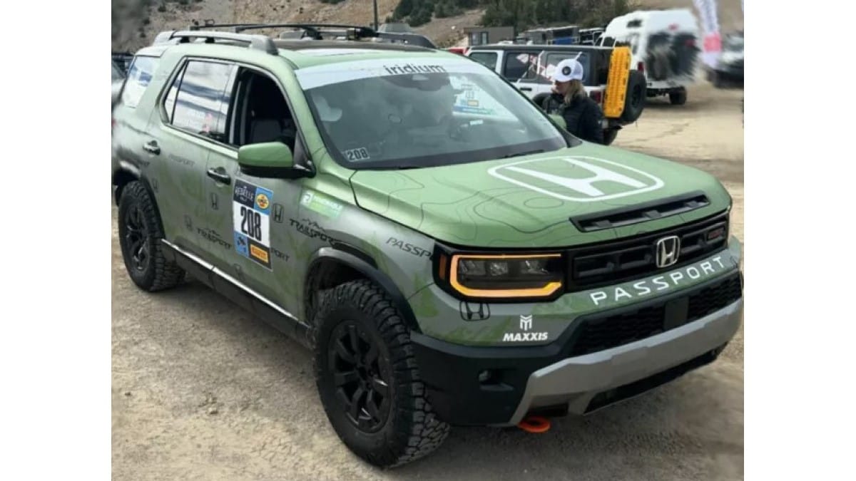 The updated 2026 Honda Passport seen from a front quarter angle as entered in the 2025 Rebelle Rally