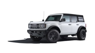 The 2025 Ford Bronco Custom Garage Matte Black Package seen from a front quarter angle