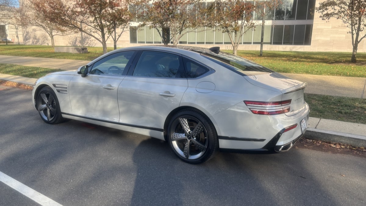 The 2025 Genesis G80 seen from a rear quarter angle