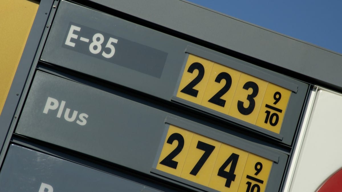 A sign advertising gasoline prices