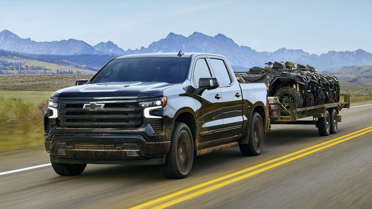 2025 Chevrolet Silverado 1500 towing a trailer.