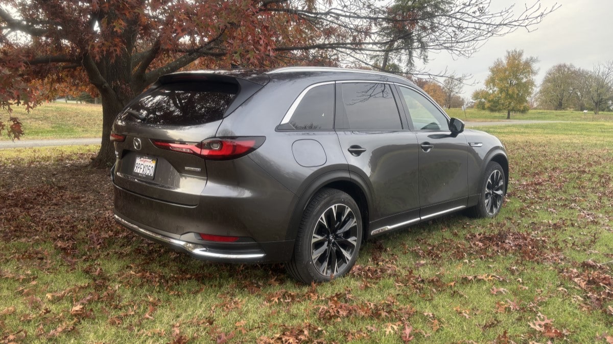 The 2025 Mazda CX-90 PHEV seen from a rear quarter angle