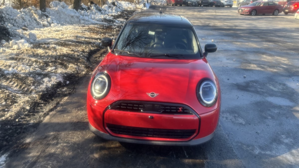 The 2025 Mini Cooper Hardtop 2-Door seen from head on in snow