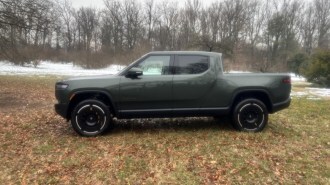 The 2025 Rivian R1T seen in profile