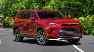 2025 Toyota Grand Highlander Platinum in Ruby Flare Pearl
