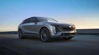 The 2026 Cadillac Lyriq-V seen from a low front quarter angle