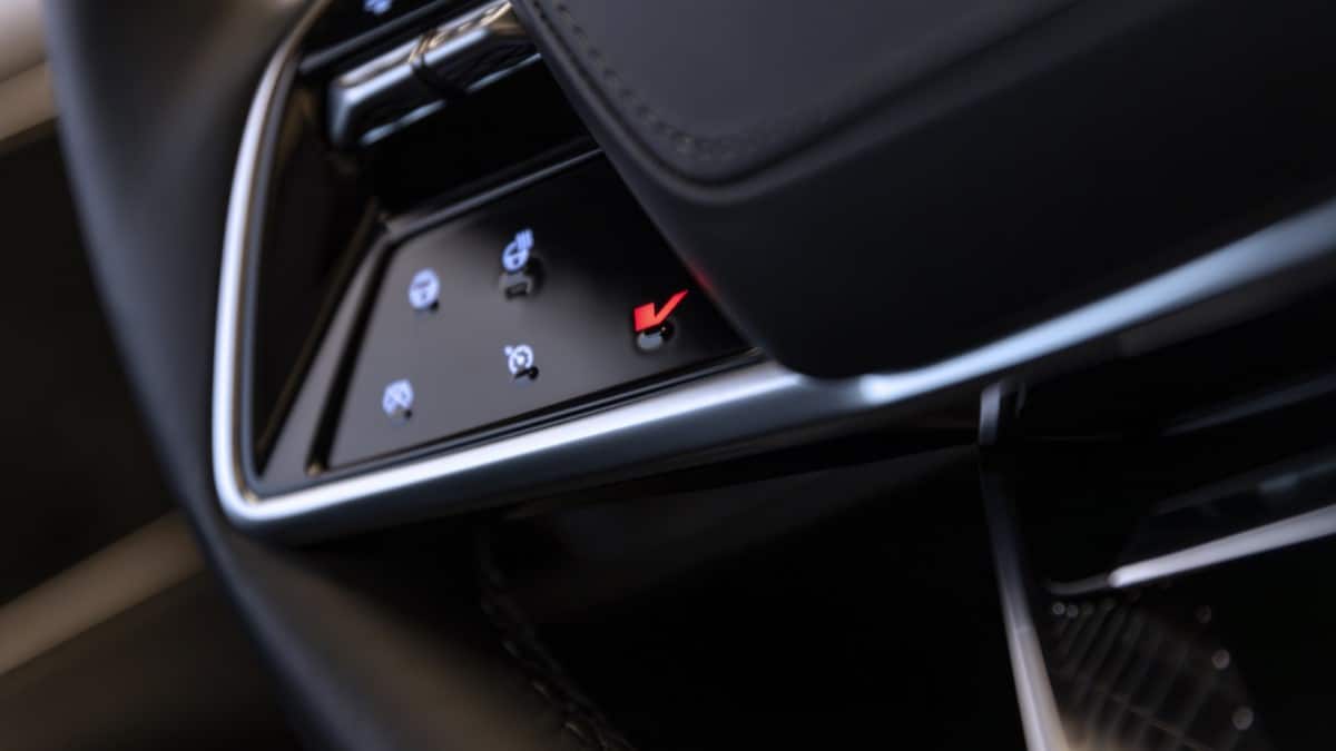 The steering wheel of the 2026 Cadillac Lyriq-V, with its V-mode button