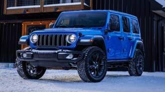The 2025 Jeep Wrangler 4xe Backcountry seen from a front quarter angle