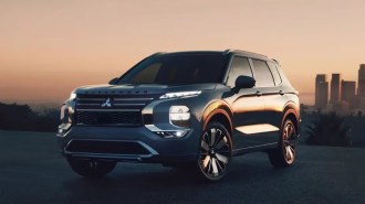 The 2025 Mitsubishi Outlander seen from a front quarter angle