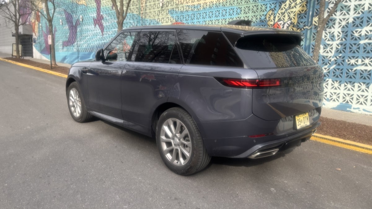 The 2025 Range Rover Sport seen from a rear quarter angle