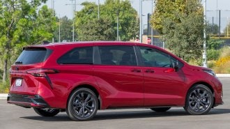2025 Toyota Sienna in red.