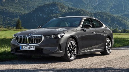2025 BMW 5 Series 550e in gray.
