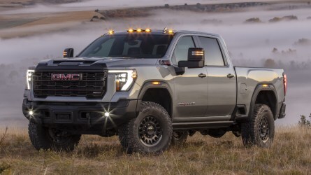 2025 GMC Sierra 2500HD AT4X parked in a field.