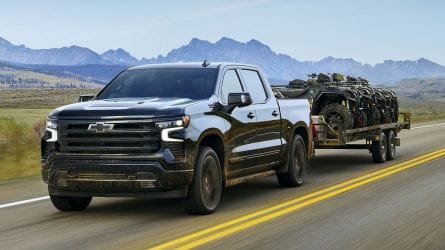 2025 Chevrolet Silverado 1500 towing a trailer.