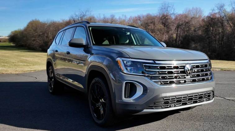 2025 Volkswagen Atlas parked near a field.