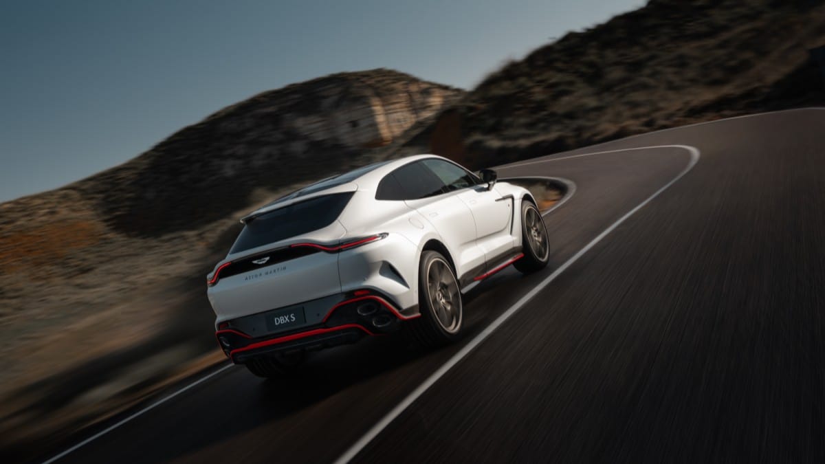 The 2026 Aston Martin DBX S seen from a rear quarter angle